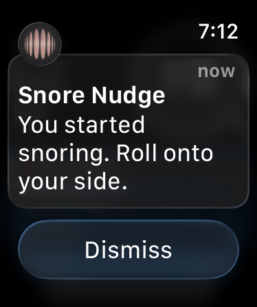 Apple Watch showing a Snore Nudge notification reading "You started snoring. Roll onto your side."