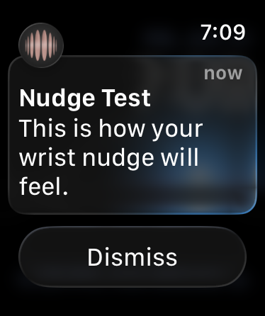Apple Watch showing a Nudge Test notification reading "This is how your wrist nudge will feel"
